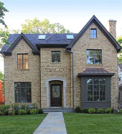 60 style yellow brick houses with metal awning|yellow metal roof exterior homes.